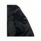 Veste noire Secondstore C.P. Company Shell-R avec lentille emblématique sur la manche et poche zippée technique