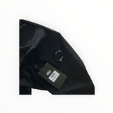 Veste noire Secondstore C.P. Company Pro-Tek avec lentille emblématique sur la manche et étiquette de prix