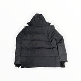 Parka doudoune noire Secondstore Canada Goose avec capuche, vue arrière montrant le matelassage et les poignets ajustés