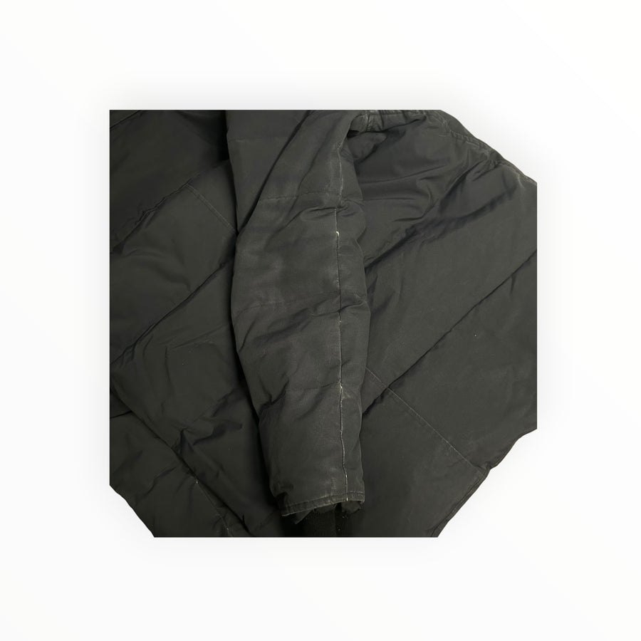 Doudoune noire Secondstore Canada Goose avec matelassage horizontal et poignets ajustés pour le grand froid