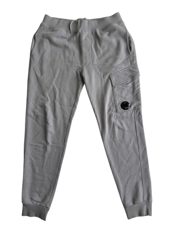 Secondstore grey C.P. Company jogging pants with a side cargo pocket and signature lens detail on a white background