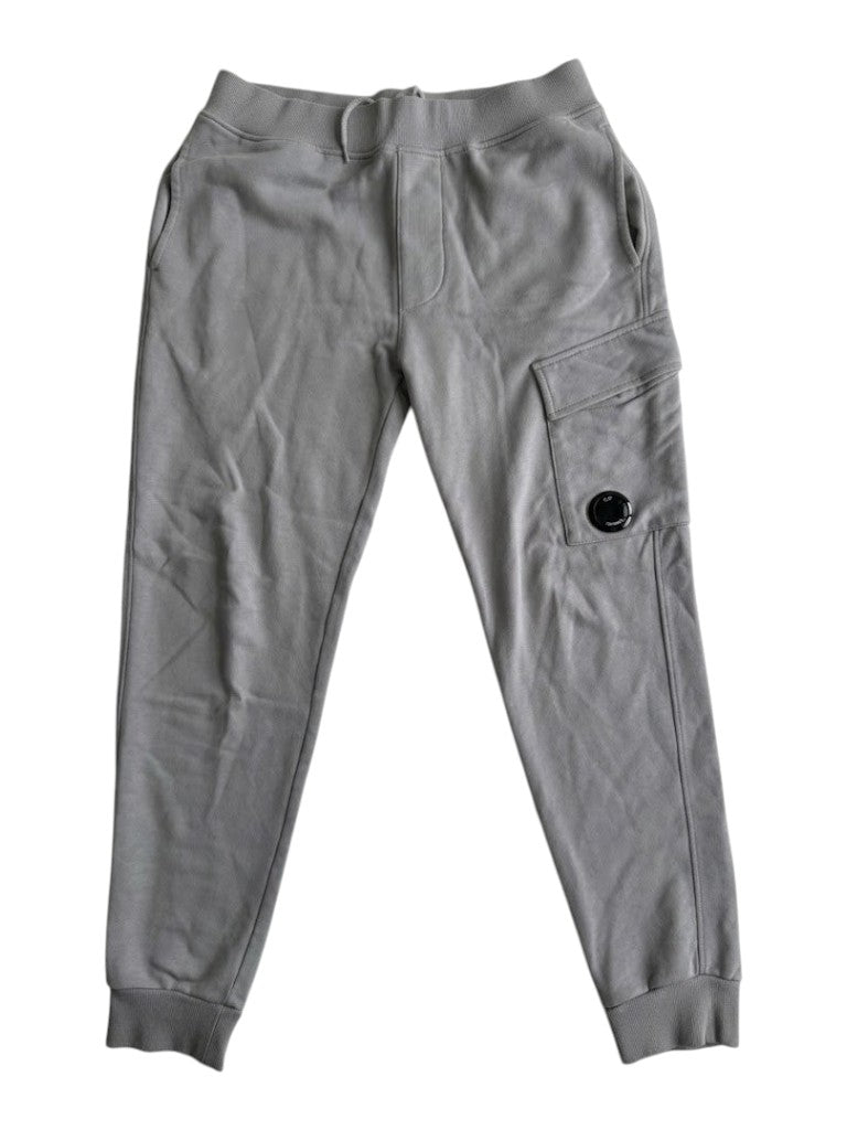 Secondstore grey C.P. Company jogging pants with a side cargo pocket and signature lens detail on a white background