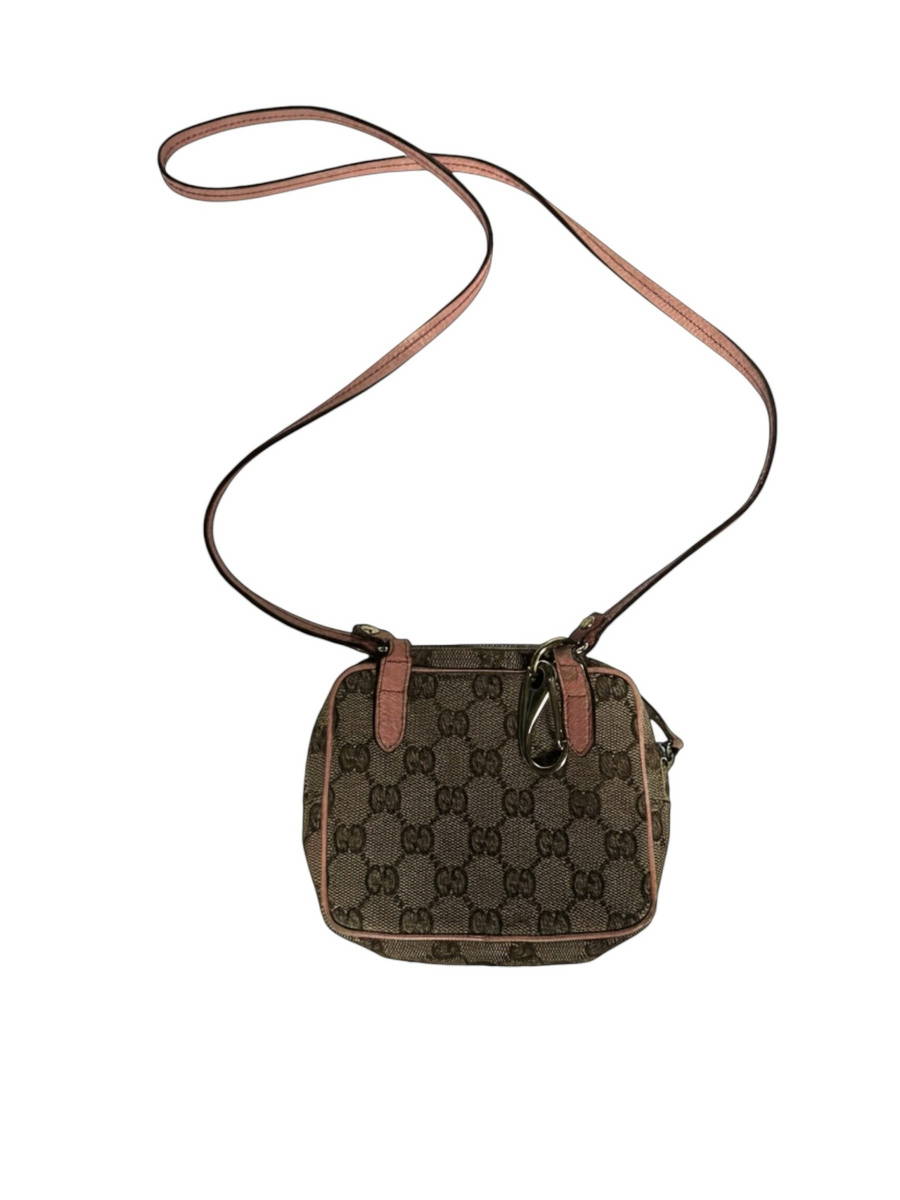 Secondstore Gucci monogram canvas crossbody bag with pink leather trim and adjustable shoulder strap.