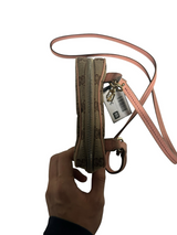 Secondstore Gucci monogram canvas crossbody bag with pink leather trim and adjustable strap, side view.