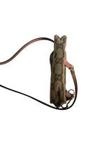 Secondstore Gucci monogram canvas crossbody bag with pink leather trim, shown from a side profile view.