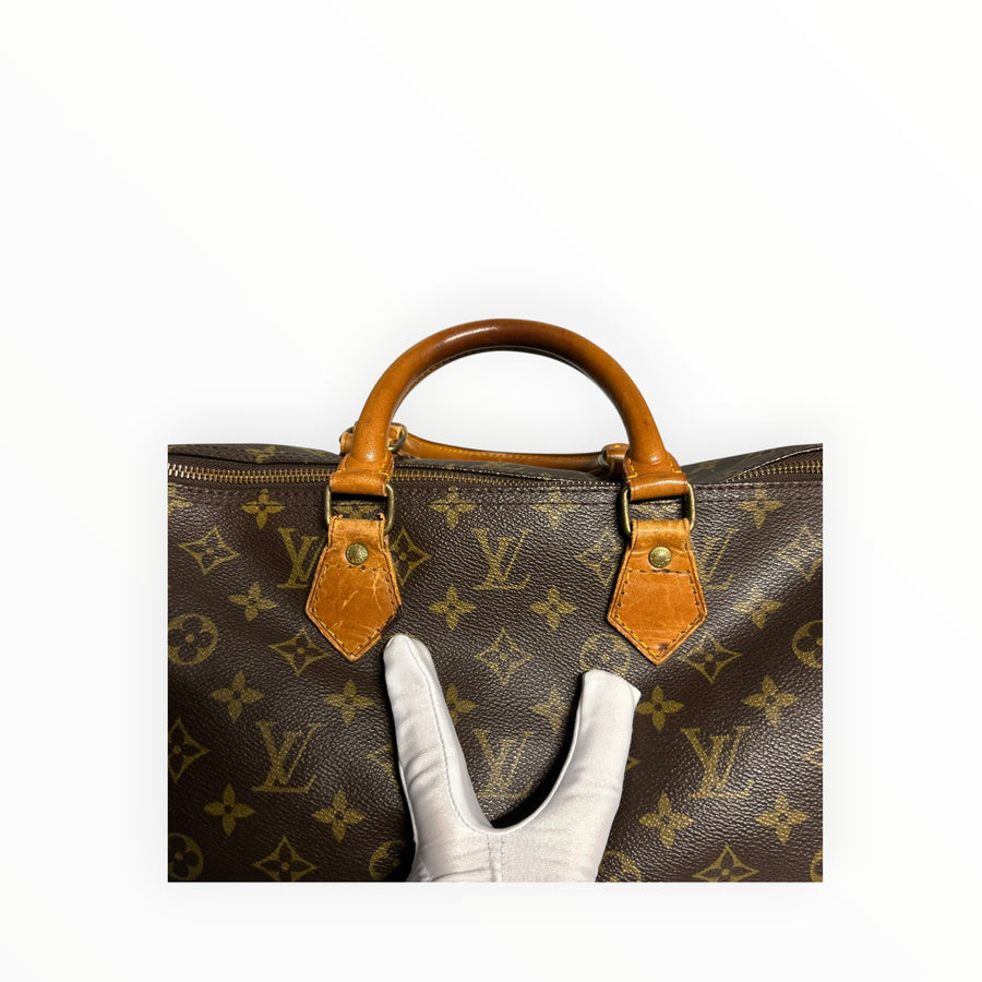 Sac de voyage Secondstore Louis Vuitton Speedy en toile Monogram marron avec poignées en cuir de vachette patiné