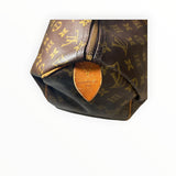 Détail de la fermeture et de la toile Monogram marron du sac de voyage Secondstore Louis Vuitton Speedy