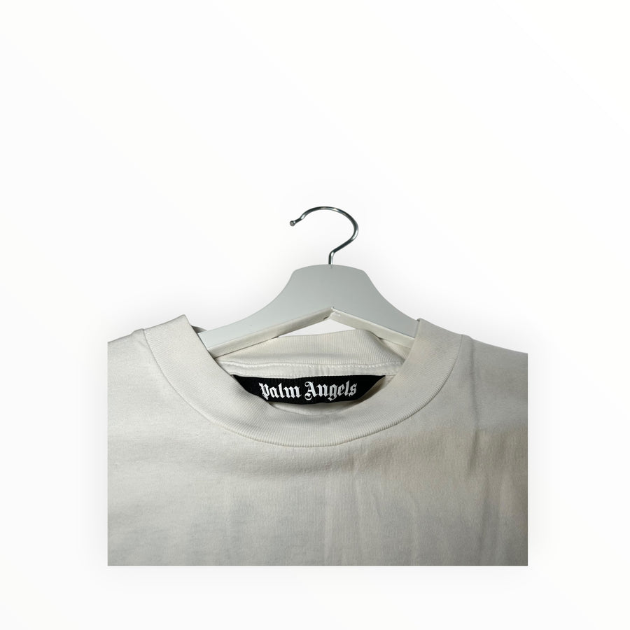 Secondstore off-white Palm Angels cotton t-shirt featuring a black branded neck label on a white hanger.