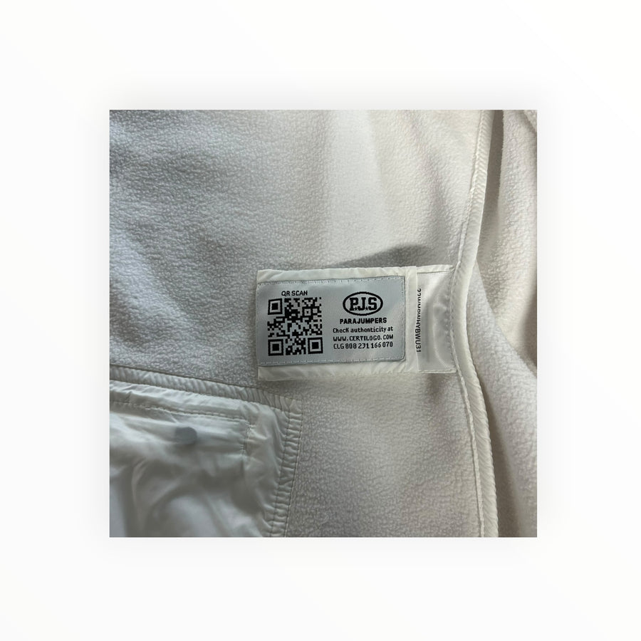 Secondstore Parajumpers white jacket interior showing the PJS authenticity label with QR code and fleece lining