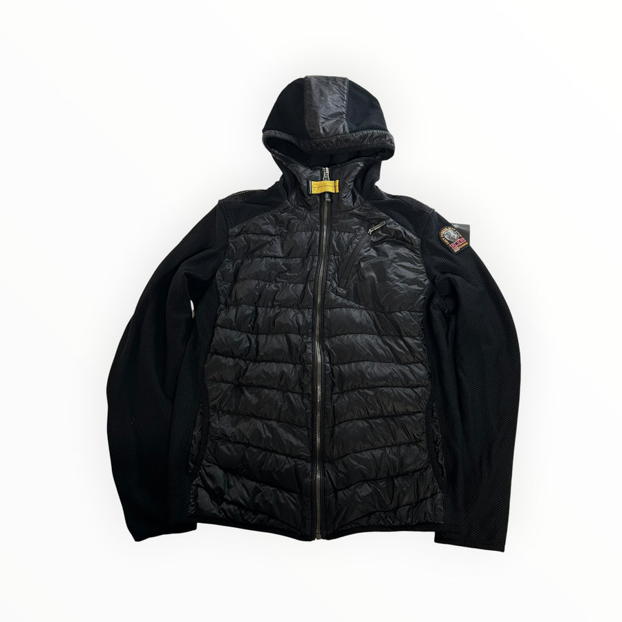 Veste hybride noire Secondstore Parajumpers avec capuche, panneaux matelassés et détails techniques sur les manches.