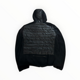 Veste hybride noire Secondstore Parajumpers avec dos matelassé et capuche, vue arrière sur fond blanc.