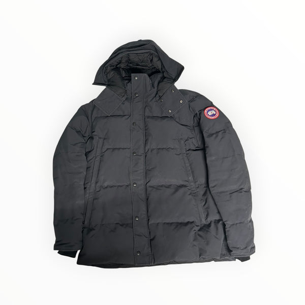 Parka noire Secondstore Canada Goose avec capuche, fermeture zippée et logo emblématique sur la manche