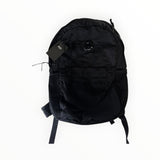 Sac à dos noir Secondstore C.P. Company en nylon résistant avec poche frontale zippée et détail de lentille iconique