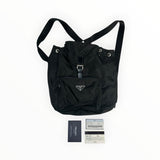 Sac à dos Secondstore Prada en nylon noir avec poche frontale zippée, rabat à boucle et cartes d'authenticité