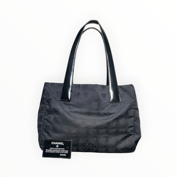 Sac cabas Secondstore Chanel New Travel Line en toile noire avec anses en cuir et carte d'authenticité