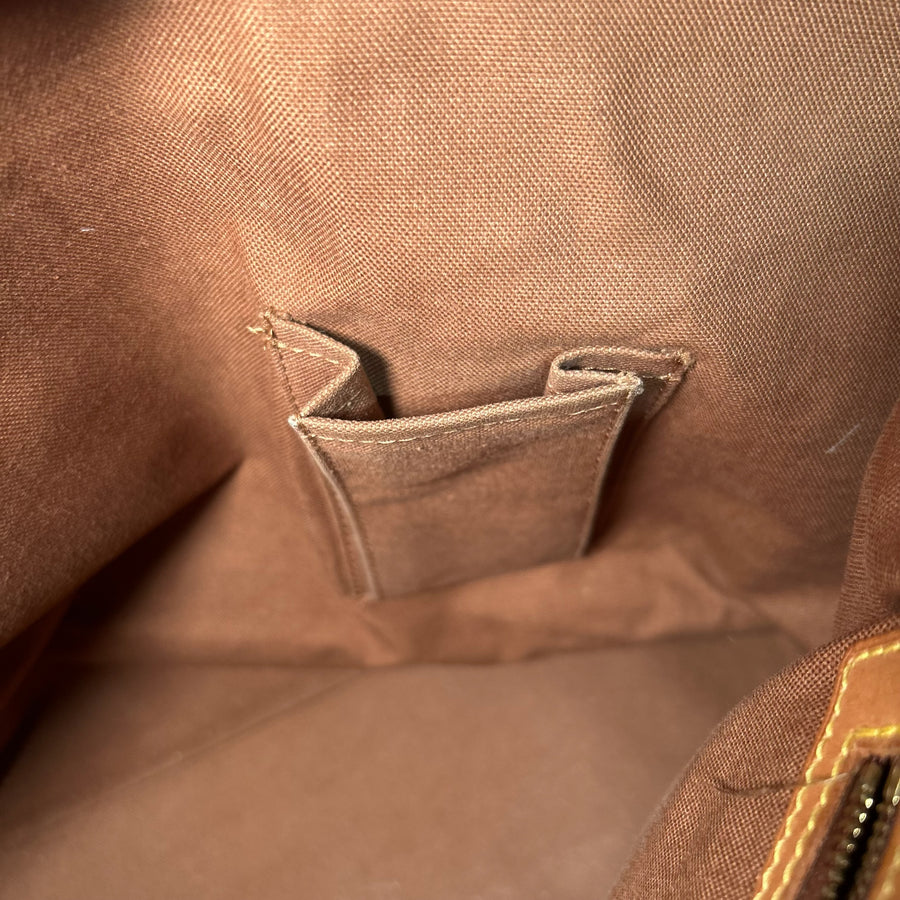 Intérieur du sac cabas Secondstore en toile marron avec poche de rangement pratique et finitions en cuir