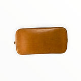 Base en cuir de vachette naturel du sac Louis Vuitton Alma Secondstore montrant la patine authentique