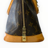 Détail de la fermeture éclair dorée et de la toile Monogram marron du sac à main Louis Vuitton Alma chez Secondstore