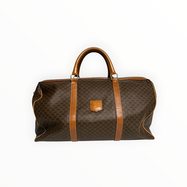 Sac de voyage Secondstore CELINE en toile enduite Macadam marron avec finitions en cuir miel et détails dorés.