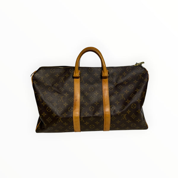Sac de voyage Louis Vuitton Keepall en toile Monogram marron avec finitions en cuir de vachette par Secondstore