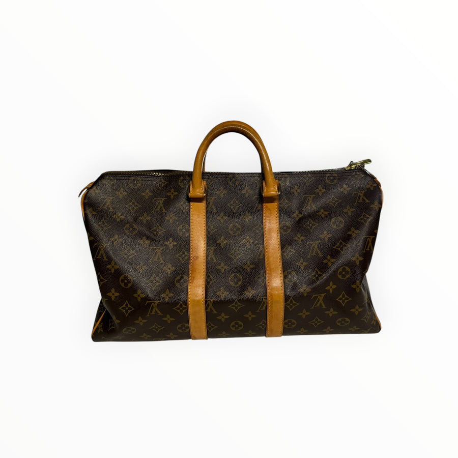 Sac de voyage Louis Vuitton Keepall en toile Monogram marron avec finitions en cuir de vachette par Secondstore