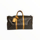 Sac de voyage Secondstore Louis Vuitton Keepall en toile Monogram marron avec finitions en cuir de vachette naturel.