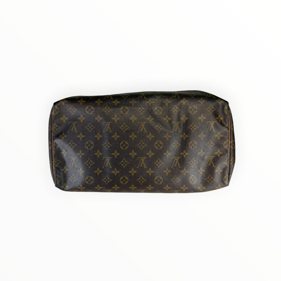 Sac de voyage Louis Vuitton Speedy en toile Monogram marron iconique, proposé par Secondstore
