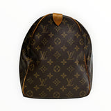 Sac de voyage Secondstore Louis Vuitton en toile enduite Monogram marron avec finitions en cuir de vachette naturel