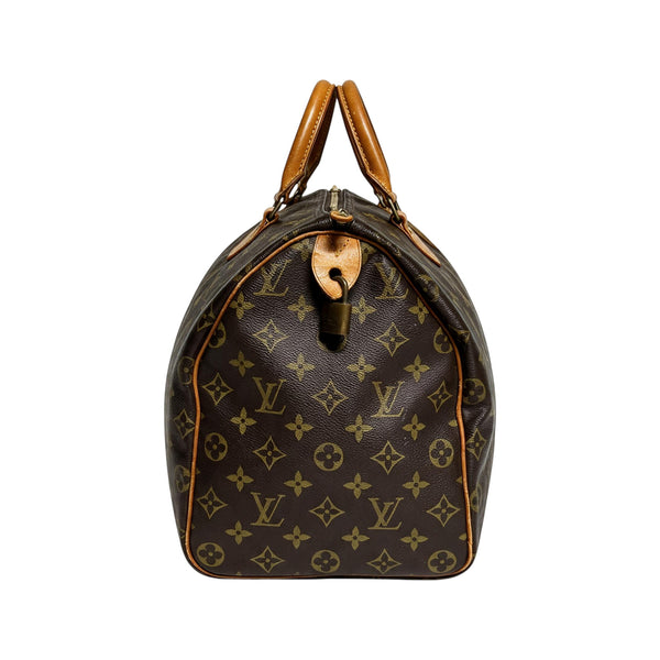 Sac Secondstore Louis Vuitton Speedy 35 en toile Monogram, vue de côté avec cadenas doré
