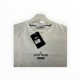 Secondstore white Stone Island Archivio cotton crew neck t-shirt with front logo and black brand tag on hanger