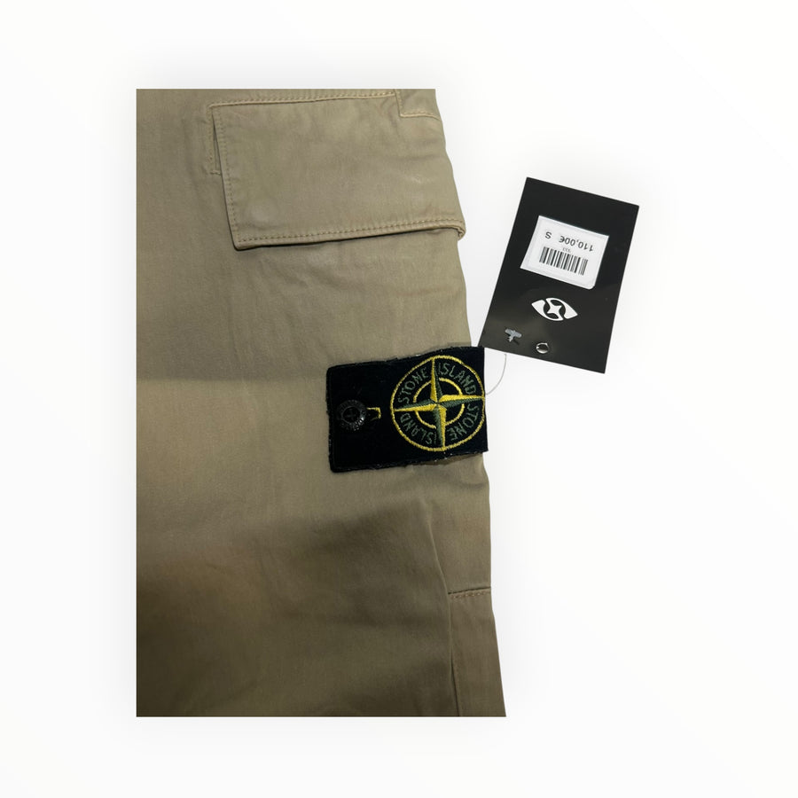 Secondstore beige Stone Island cargo trousers featuring the iconic compass patch and a retail price tag.