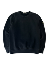 Secondstore black Stone Island crewneck sweatshirt featuring the brand logo label on the inner collar
