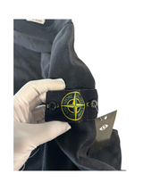 Secondstore black Stone Island crewneck sweatshirt featuring the signature embroidered compass sleeve patch