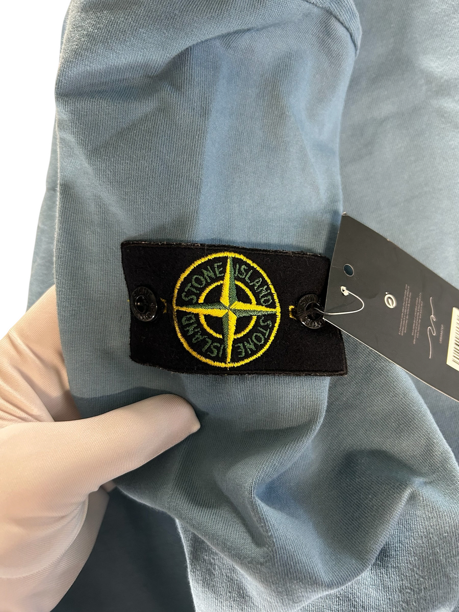 Secondstore Stone Island crewneck sweatshirt in faded blue cotton with iconic removable compass badge on the sleeve