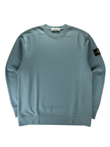 Secondstore Stone Island muted blue cotton crewneck sweatshirt with iconic compass sleeve badge