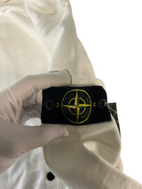 Secondstore white cotton hoodie sleeve featuring the iconic embroidered Stone Island compass patch with button detail