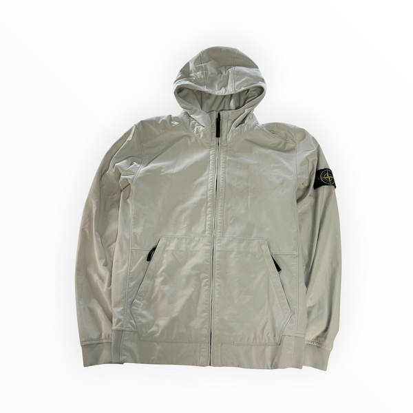 Secondstore Stone Island light grey hooded soft shell jacket with zip closure and iconic sleeve badge