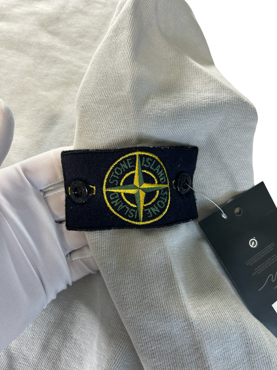Secondstore Stone Island crewneck sweatshirt in light grey cotton featuring the iconic removable compass sleeve badge