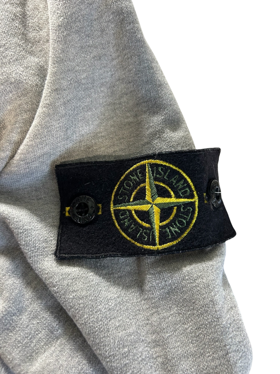 Secondstore grey cotton Stone Island crewneck sweatshirt sleeve featuring the iconic detachable compass badge