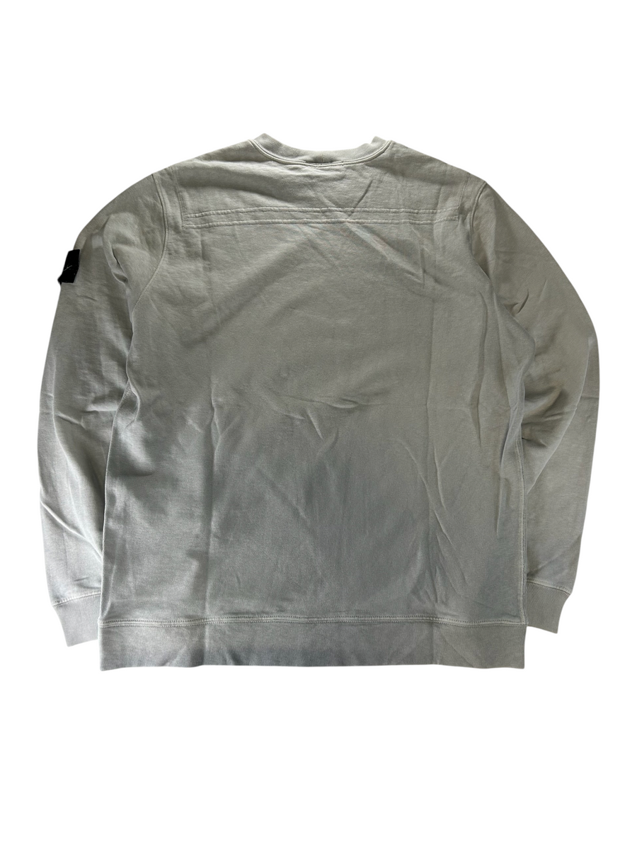 Secondstore Stone Island crewneck sweatshirt in light grey cotton with signature sleeve badge and back seam detail.