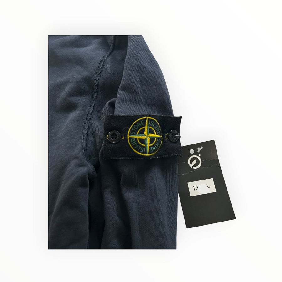 Secondstore navy Stone Island cotton sweatshirt sleeve with signature yellow and green compass badge and price tag