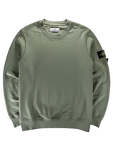 Secondstore STONE ISLAND olive green cotton crewneck sweatshirt with iconic removable compass badge on the sleeve.