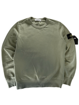 Secondstore Stone Island sage green cotton crewneck sweatshirt with iconic compass sleeve patch and ribbed trim.