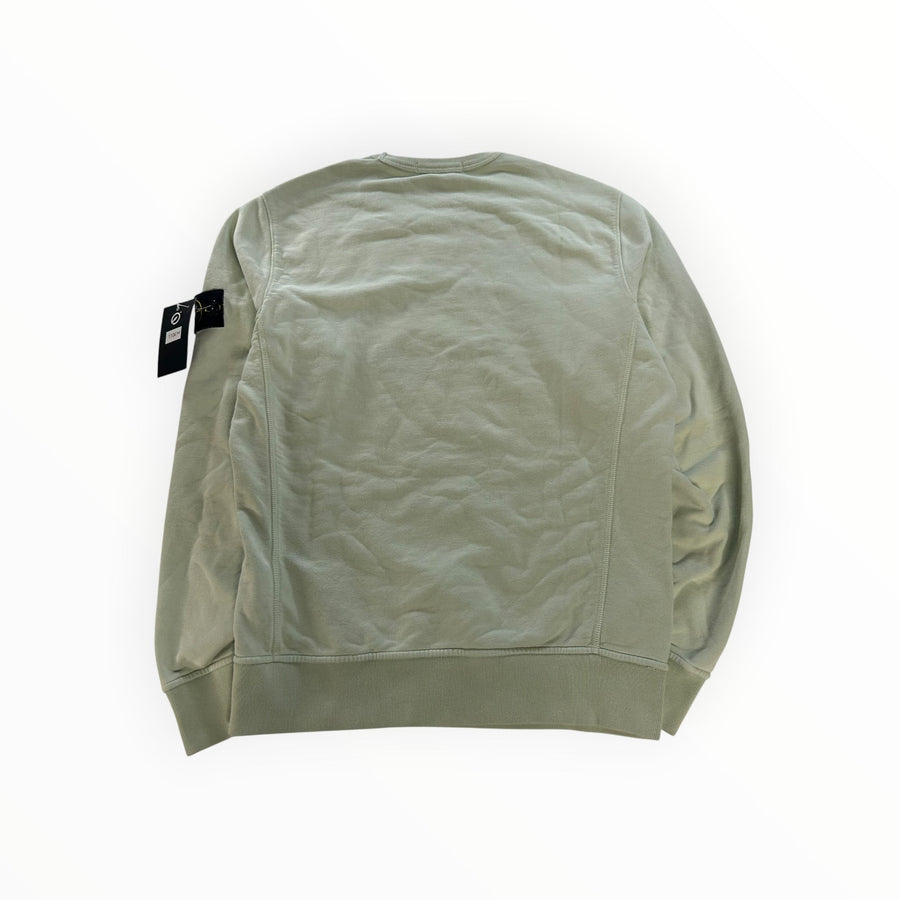 Back view of a sage green Secondstore Stone Island crewneck sweatshirt in soft cotton with a sleeve compass badge.