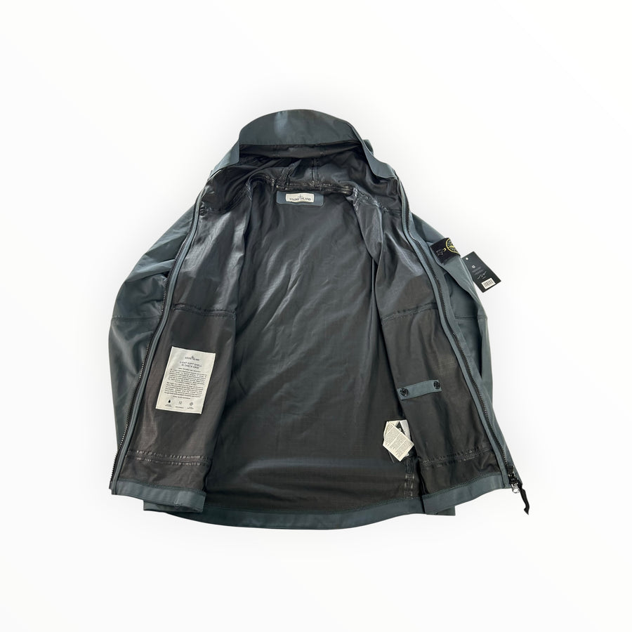 Secondstore Stone Island light soft shell hooded jacket in grey with interior check grid print and sleeve compass badge
