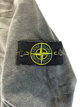 Secondstore Stone Island charcoal grey cotton sweatshirt sleeve featuring the iconic embroidered compass badge