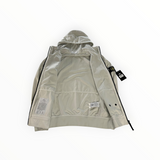 Veste à capuche Secondstore Stone Island Light Soft Shell-R beige avec badge emblématique sur la manche gauche