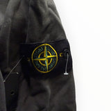Badge boussole emblématique sur la manche d'un sweat-shirt gris anthracite Secondstore en coton